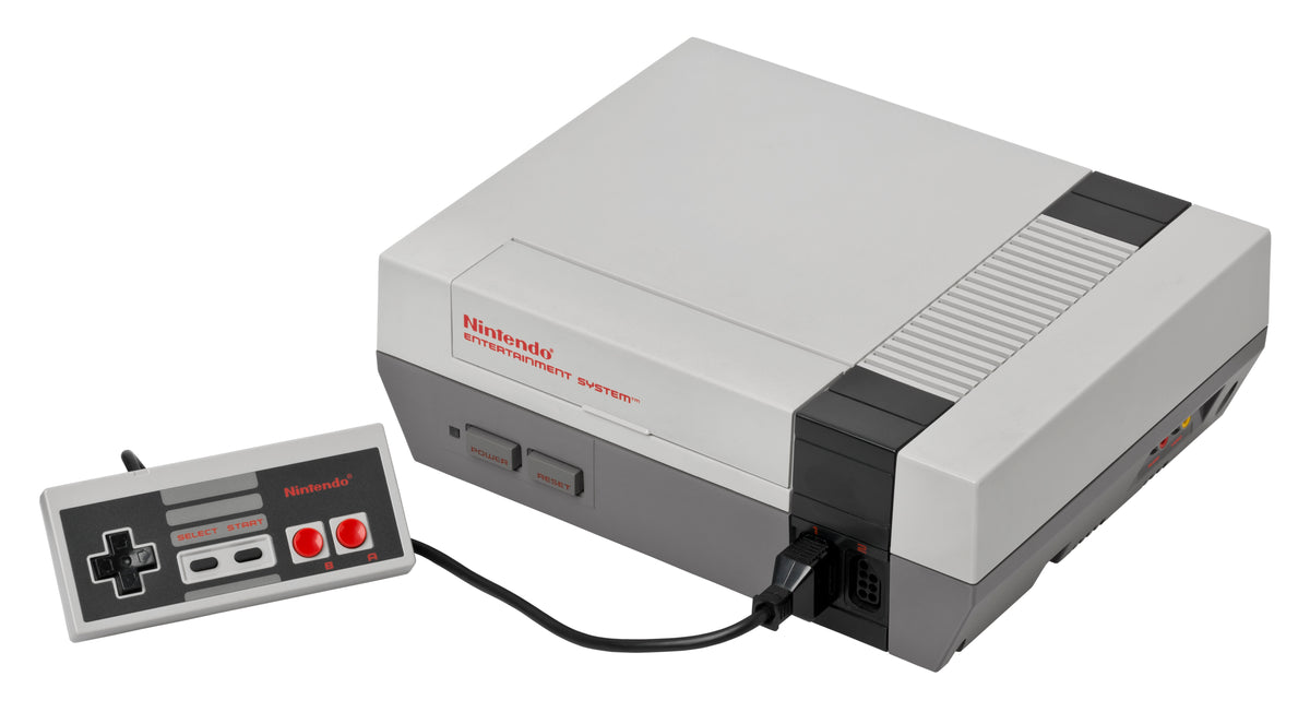 Consola Nintendo Entertainment System (NES) com comando, a plataforma onde nasceram os recordes de Super Mario