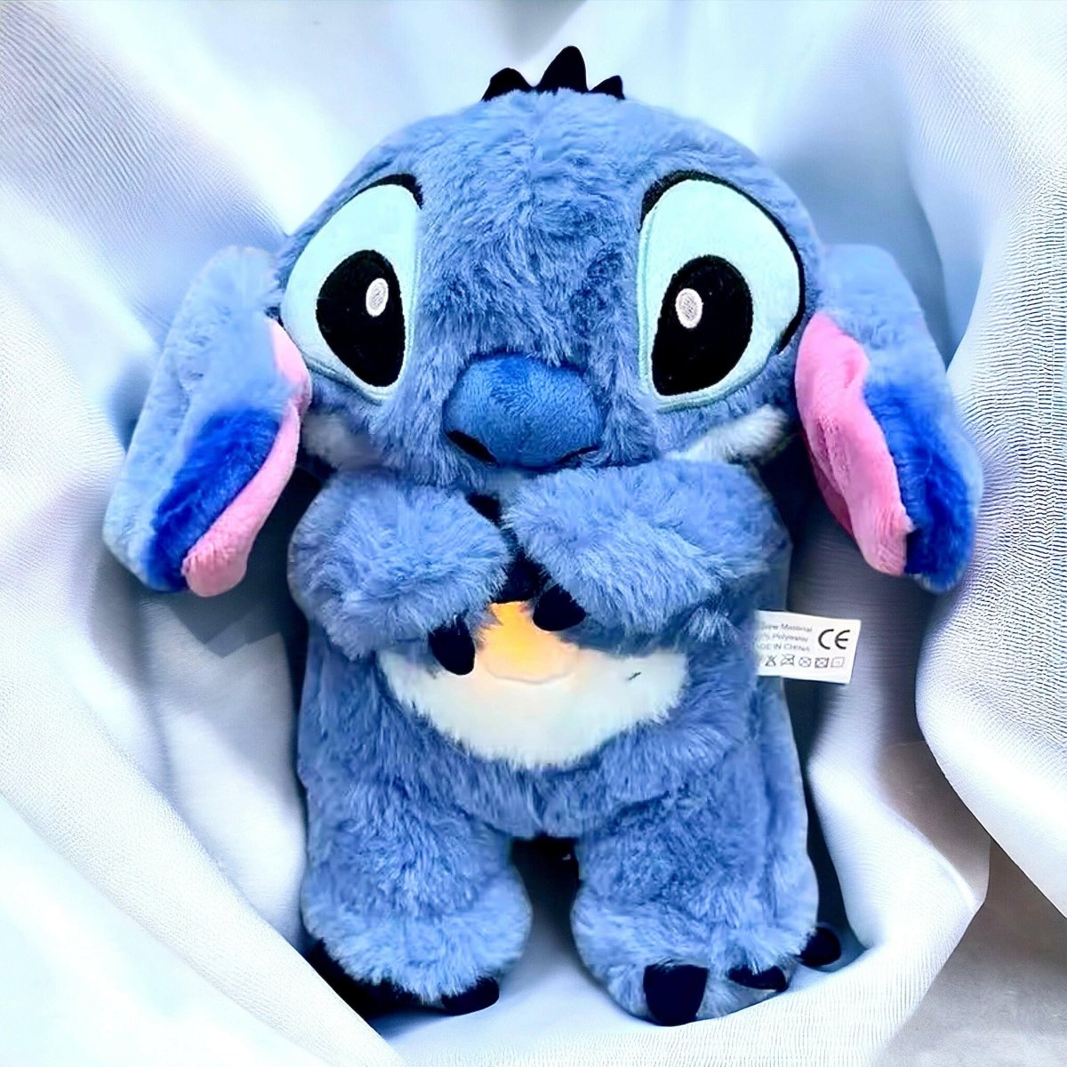 Capsule.pt - Peluche Interativo Stitch - Respira, Brilha e Toca Música - Dormir Bem