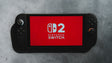 Consola Nintendo Switch 2 pousada, com o logotipo a vermelho no ecra, a nova consola que esta a gerar grande procura em 2026