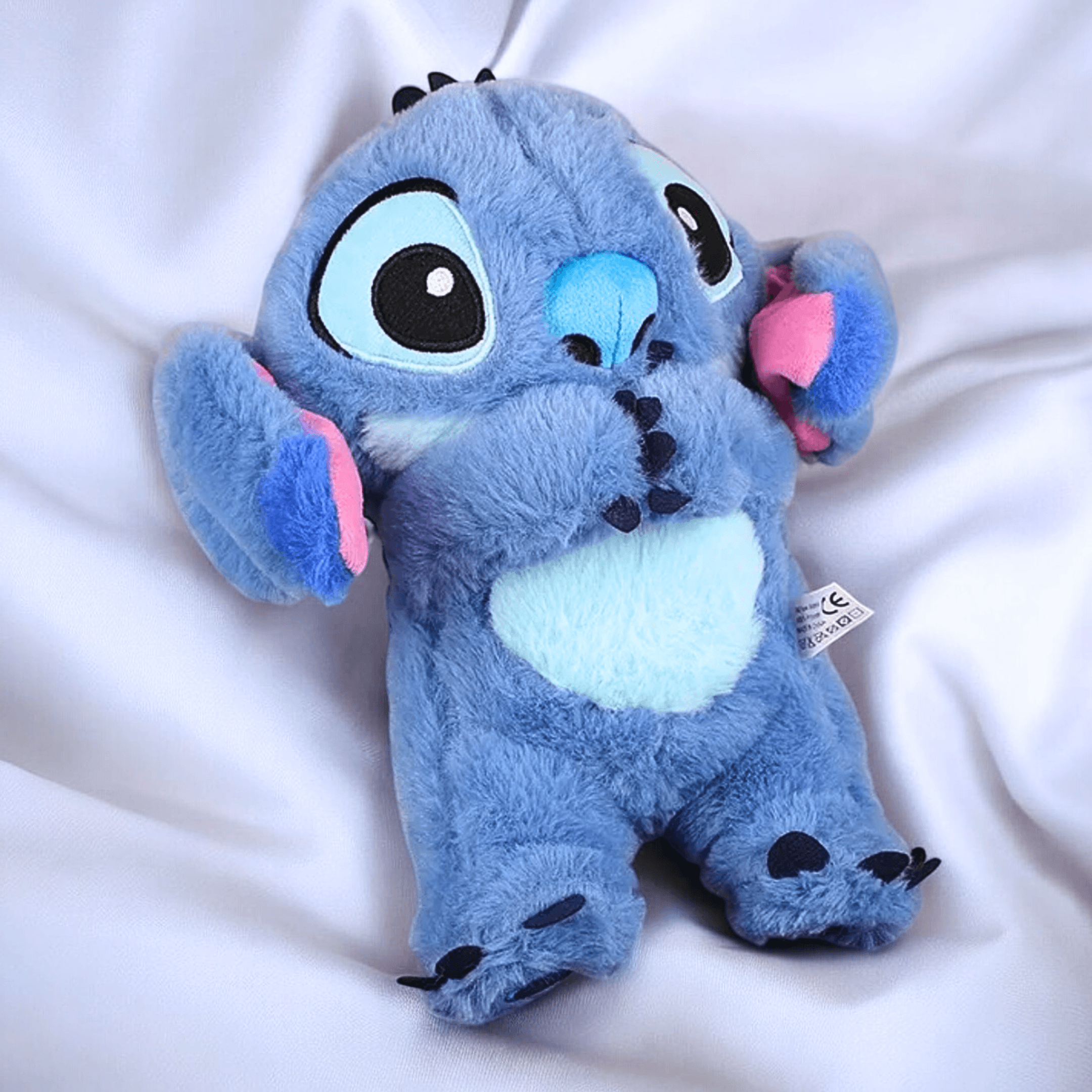 Peluche Interativo Stitch - Respira, Brilha e Toca Música - Dormir Bem - Capsule.pt